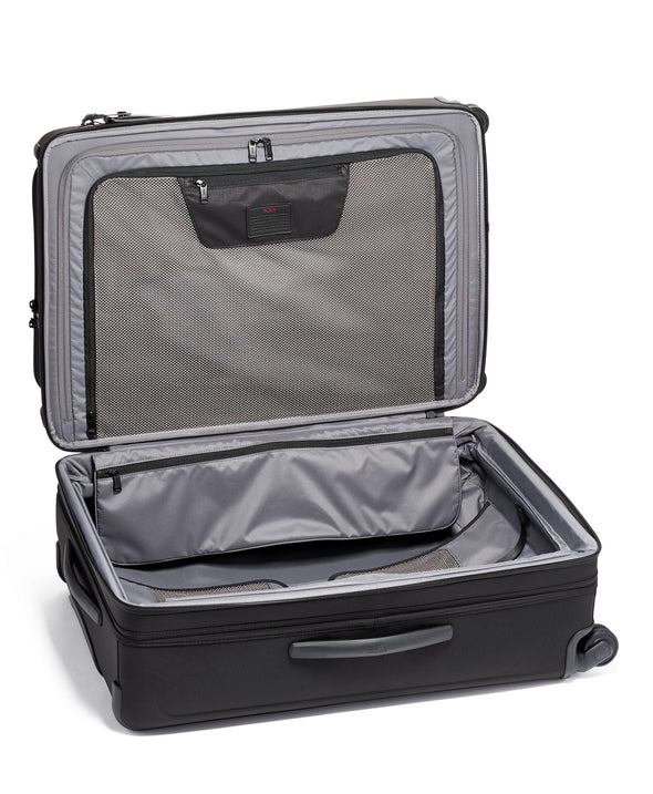 Alpha Medium Trip Expandable 4 Wheel Packing Case -black